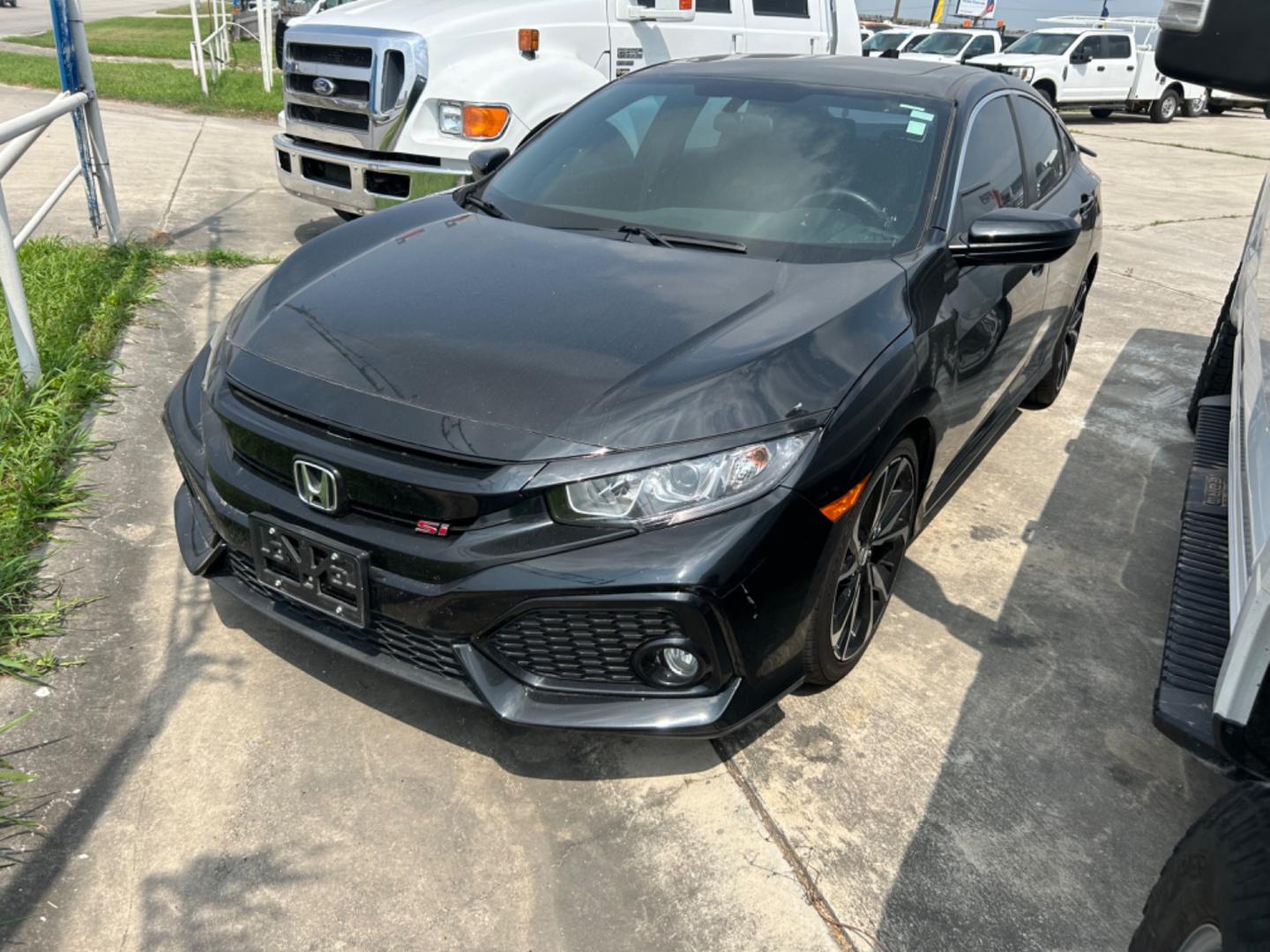 2017 Black Honda Civic Si 4dr Sedan 6M (2HGFC1E52HH) with an 1.5L L4 DOHC 16V TURBO engine, 6M transmission, located at 1687 Business 35 S, New Braunfels, TX, 78130, (830) 625-7159, 29.655487, -98.051491 - Photo#0